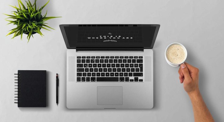 Laptop, coffee, arm — Benefits of Pursuing TEFL in the Heart of Costa Rica